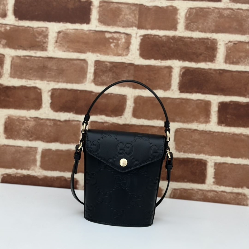 G*u*i top handle bags